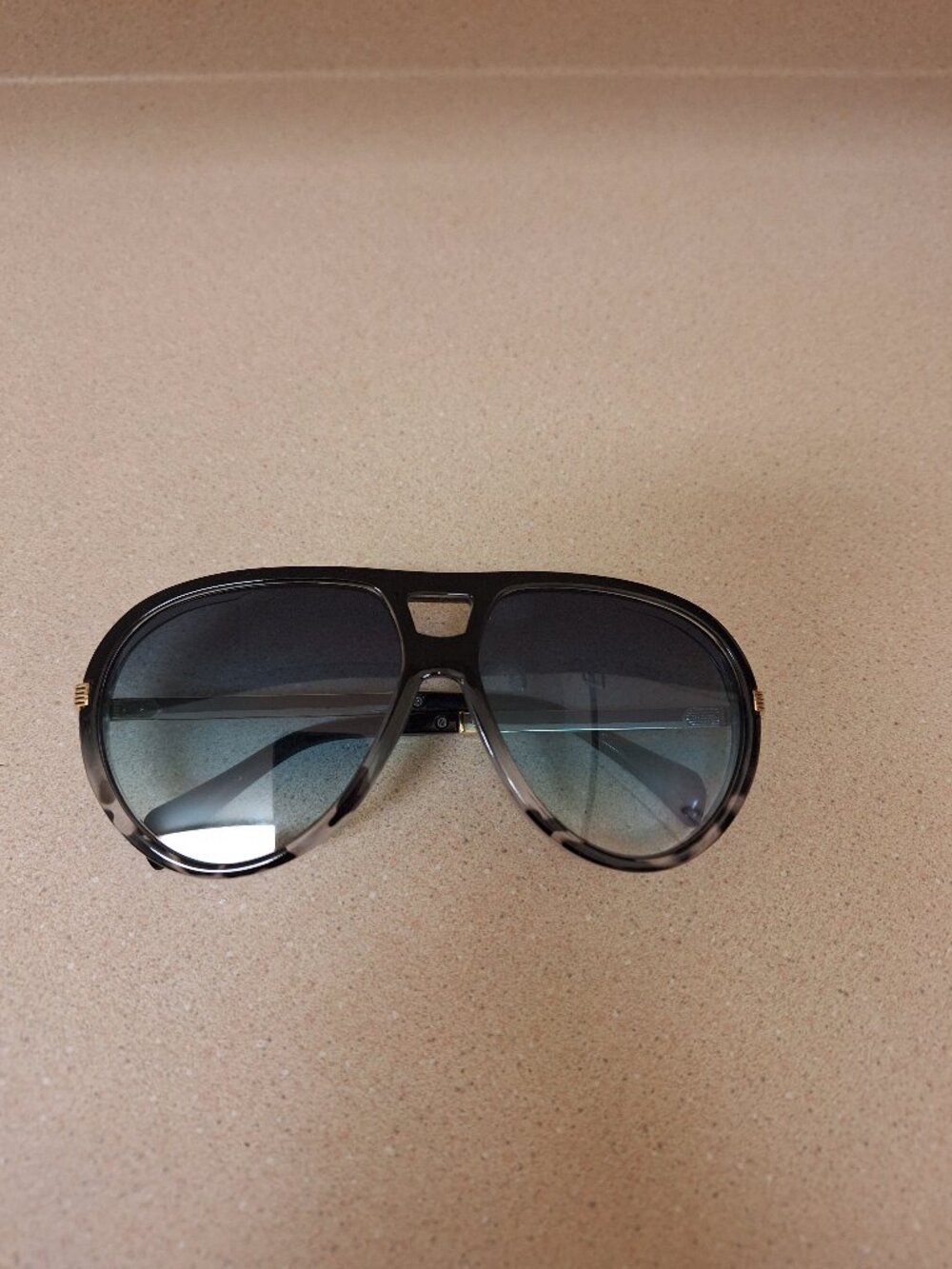 BLUE SUNGLASSES.